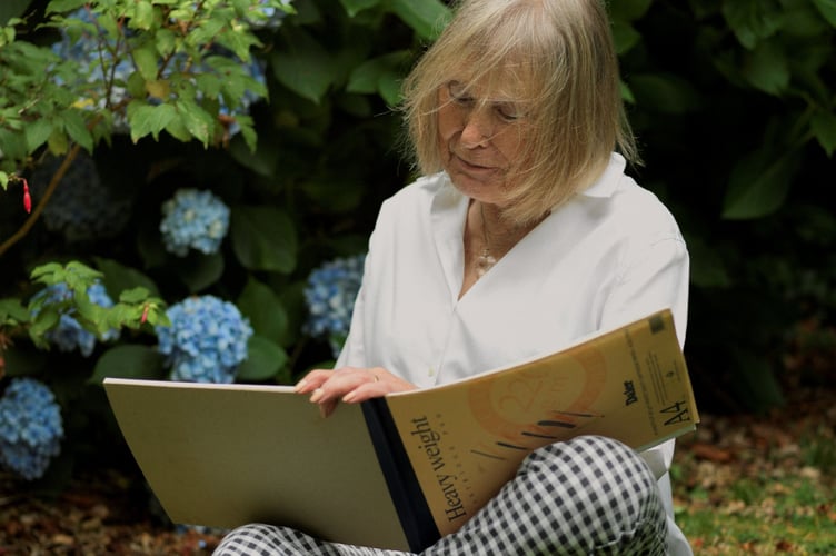 Annabelle Gregory drawing in her garden.